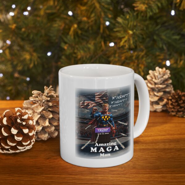 Amazing MAGA Man white ceramic mug on a table next to a Christmas tree