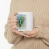 Frankenstien Will Be Free White Ceramic Mug being held by woman in beige sweater