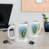 Two Frankenstien Will Be Free White Ceramic Mugs next to a laptop