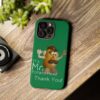 Green Custom It's Mr. Potato Head Thank YouTough Phone Cases for iPhone 15 Pro Max on a table