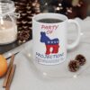 Party Of Projection white ceramic mug on a table next to a scented candle