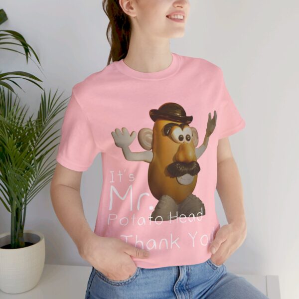 sitting girl wearing pink It's Mr. Potato Head t-shirt white text