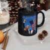 Trump Seared With Scars Black Ceramic Mug next to a scented candle