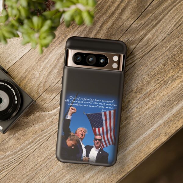 Black Trump Is Seared With Scars Custom Tough Phone Cases for Google Pixel 8 Pro on a table