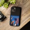 Black Trump Is Seared With Scars Custom Tough Phone Cases sales display for iPhone 15 on a table