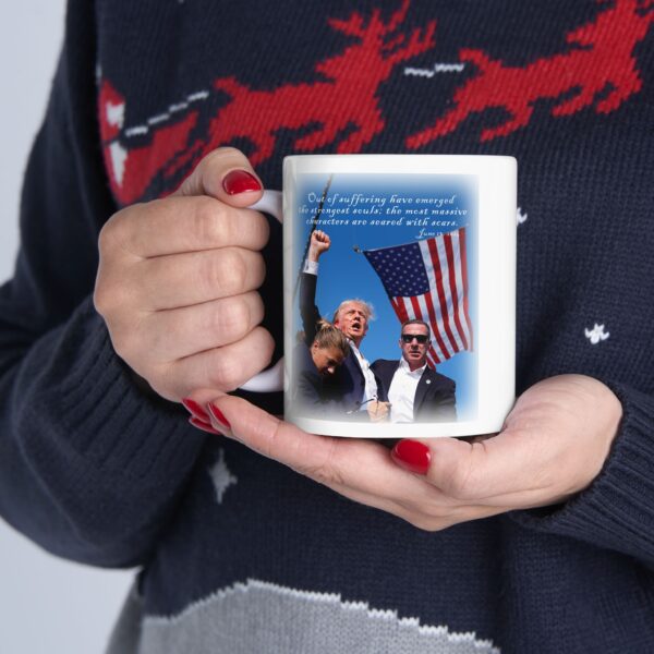 Woman wearing Christmas sweater holding Trump Seared With Scars white ceramic mug