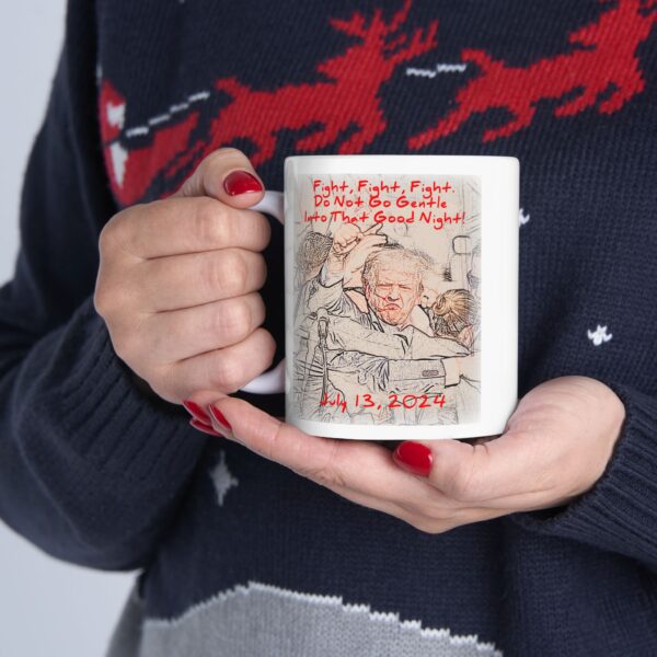 Do Not Go Gentle Into That Good Night White Ceramic Mug held by women wearing Christmas sweater