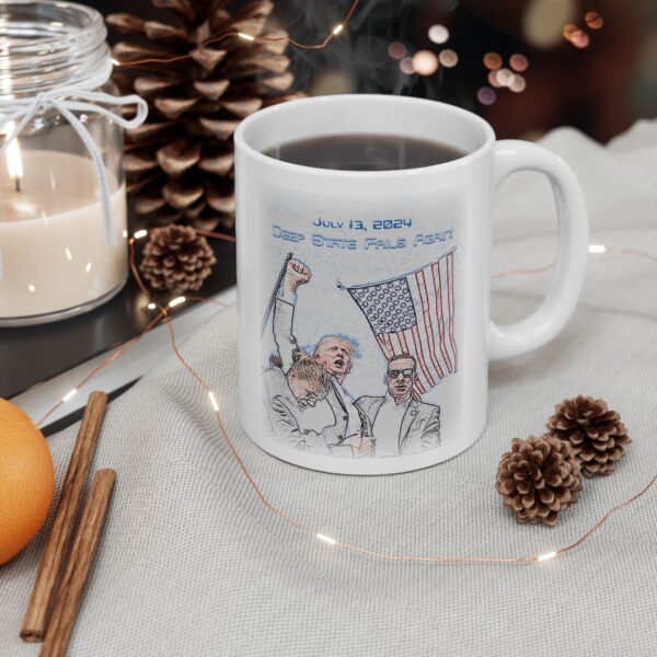 Mug Deep State Fails Again white ceramic mug next to a holiday scented candle